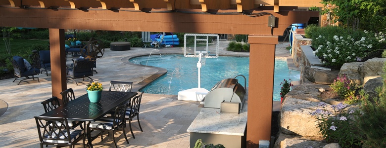 Integrating a Bar into Your Outdoor Kitchen: Design and Features Guide