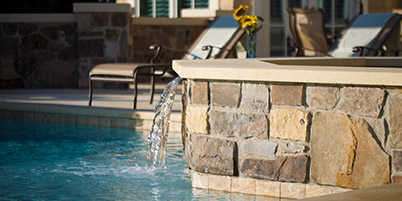 Built-In Stone Spa With Waterfall Feature