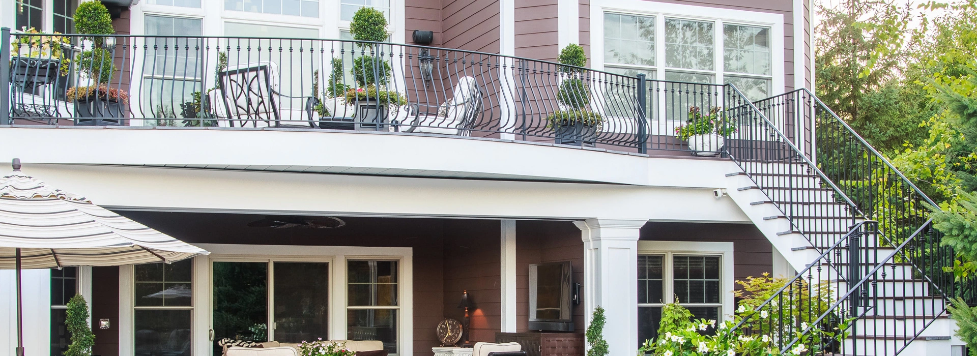 Screened-in Porch Leading to Large Decked. The Deck Covers a Dining & Seating area