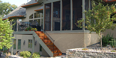 Screened-in Porch with Elevated Deck Overlooking Backyard