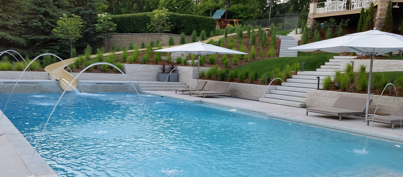 Custom landscaping with built-in waterslide