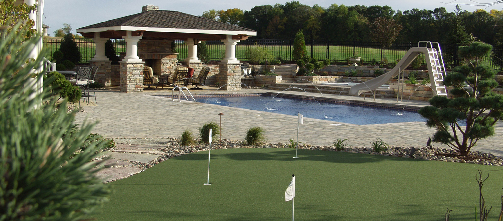 Pool with laminar jets and paver pool deck & lanai