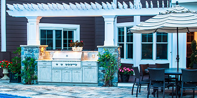Outdoor Grill with Built-In Cabinet Surround