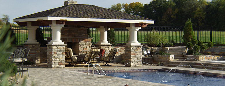 Custom Pool with Covered Outdoor Seating Area Structures