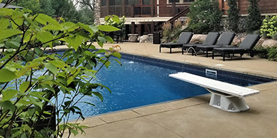 Backyard Swimming Pool With Diving Board